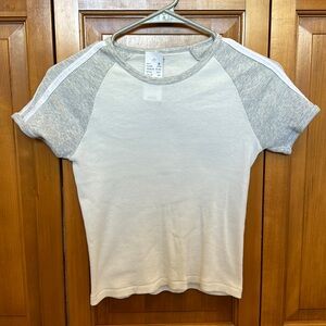 white and gray tight tee.